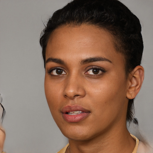 Neutral latino young-adult female with medium  brown hair and brown eyes