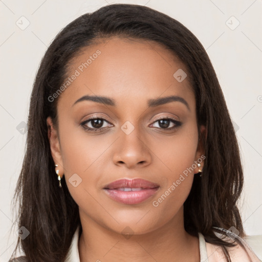 Joyful latino young-adult female with long  brown hair and brown eyes