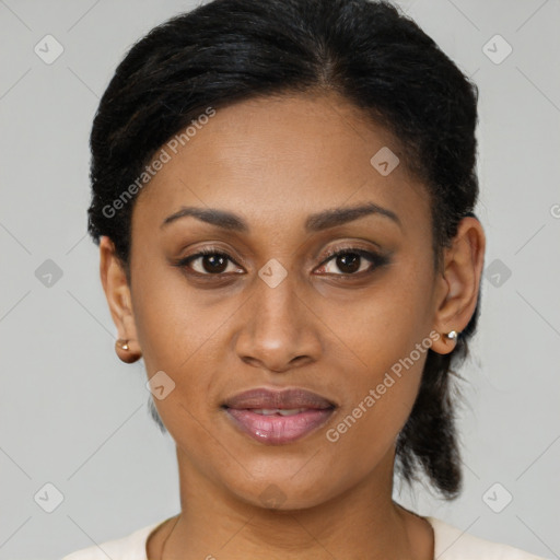 Joyful latino young-adult female with short  black hair and brown eyes