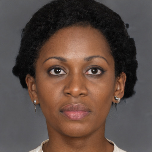 Neutral black young-adult female with short  brown hair and brown eyes