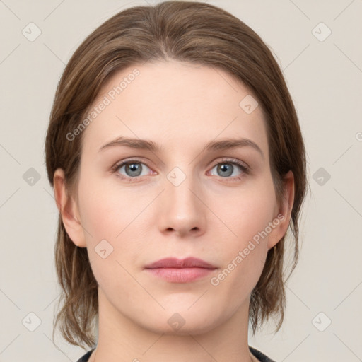 Neutral white young-adult female with medium  brown hair and grey eyes