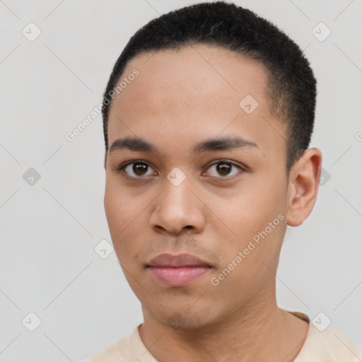 Neutral latino young-adult male with short  black hair and brown eyes