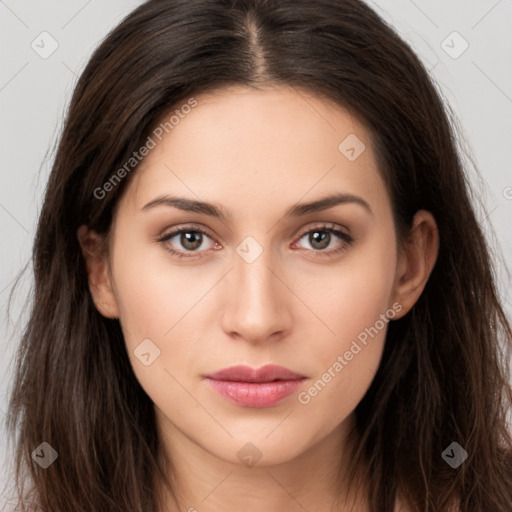 Neutral white young-adult female with long  brown hair and brown eyes