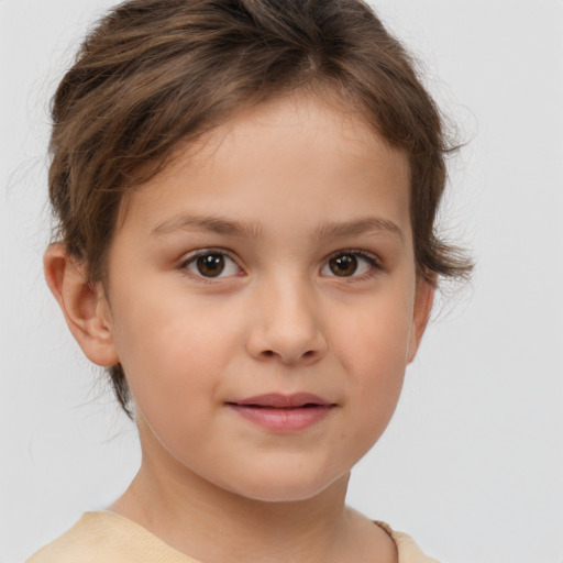 Joyful white child female with short  brown hair and brown eyes