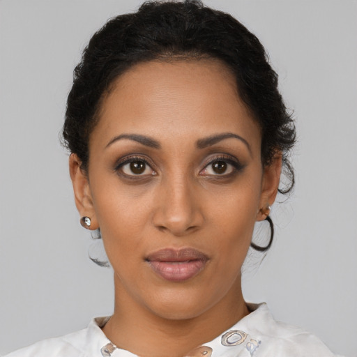 Neutral latino young-adult female with short  brown hair and brown eyes