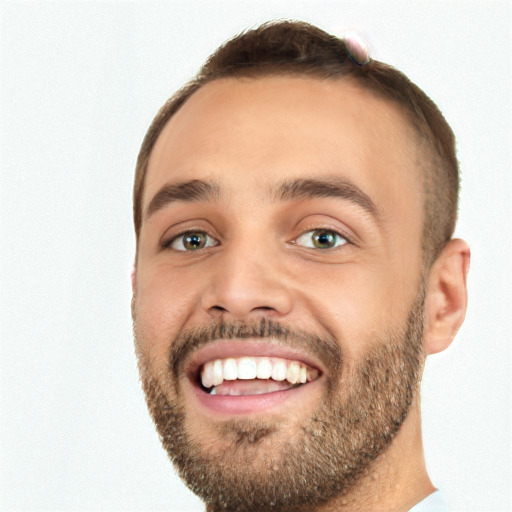 Joyful white young-adult male with short  brown hair and green eyes