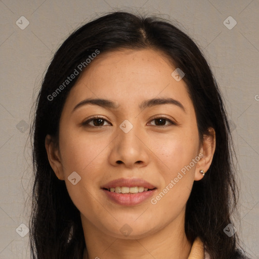 Joyful latino young-adult female with long  brown hair and brown eyes