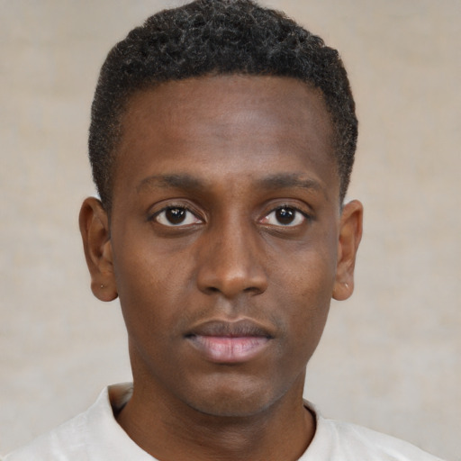 Neutral black young-adult male with short  brown hair and brown eyes