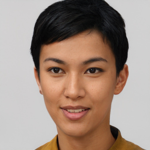 Joyful asian young-adult female with short  black hair and brown eyes