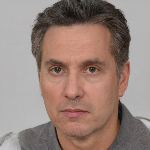 Neutral white adult male with short  brown hair and brown eyes