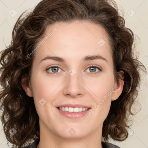 Joyful white young-adult female with medium  brown hair and green eyes