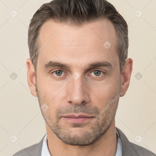 Neutral white adult male with short  brown hair and brown eyes