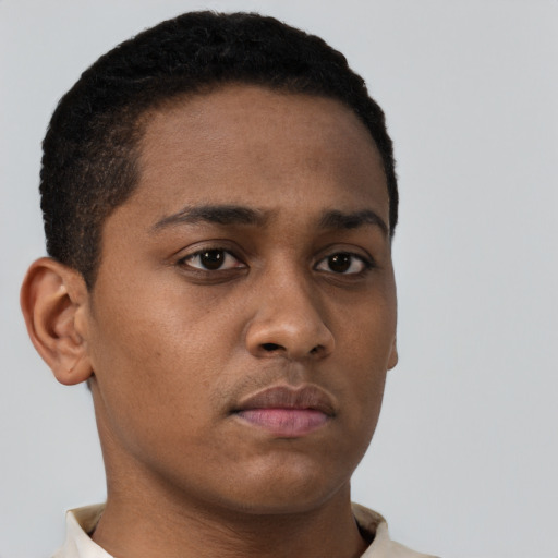 Neutral black young-adult male with short  brown hair and brown eyes