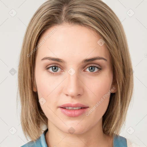 Neutral white young-adult female with medium  brown hair and green eyes