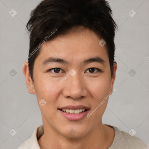 Joyful asian young-adult male with short  brown hair and brown eyes