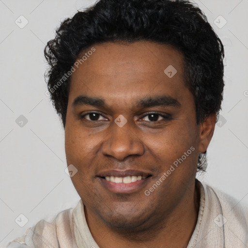 Joyful black young-adult male with short  black hair and brown eyes