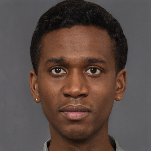 Neutral black young-adult male with short  brown hair and brown eyes