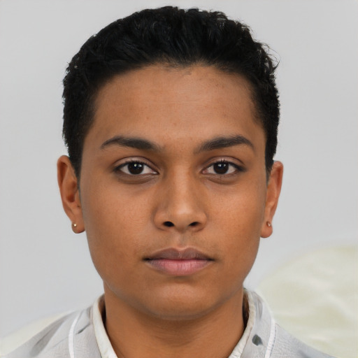 Neutral latino young-adult male with short  black hair and brown eyes