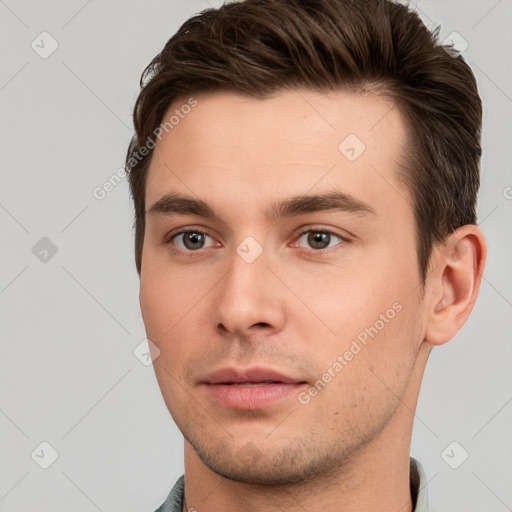 Neutral white young-adult male with short  brown hair and brown eyes