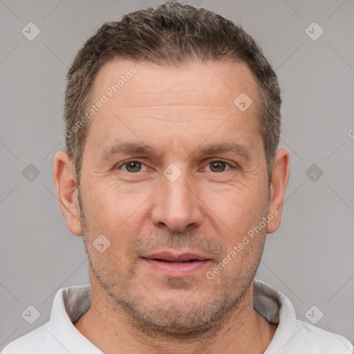 Neutral white adult male with short  brown hair and brown eyes