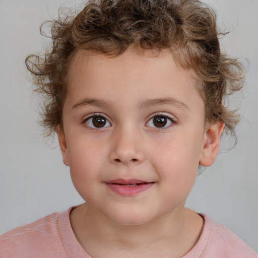 Joyful white child male with short  brown hair and brown eyes