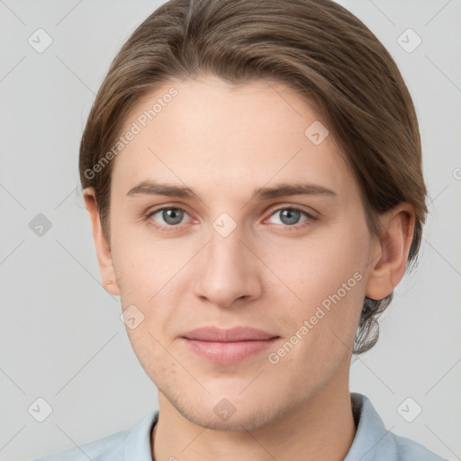 Joyful white young-adult female with short  brown hair and grey eyes