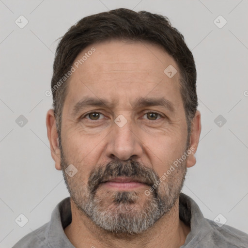 Neutral white middle-aged male with short  brown hair and brown eyes