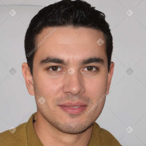 Joyful white young-adult male with short  black hair and brown eyes