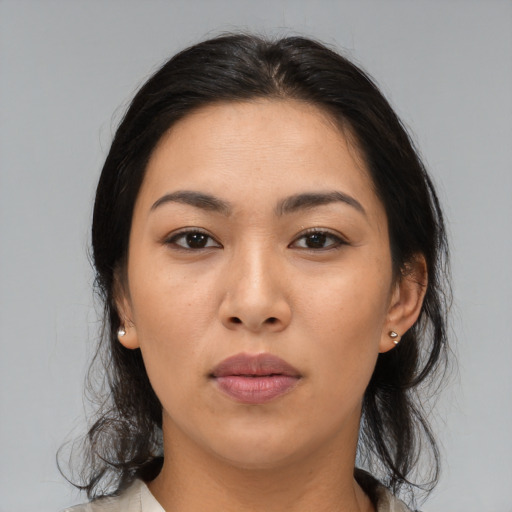 Neutral asian young-adult female with medium  brown hair and brown eyes