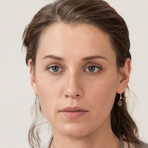 Neutral white young-adult female with medium  brown hair and grey eyes