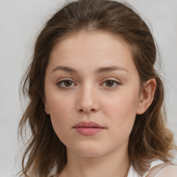 Neutral white young-adult female with medium  brown hair and grey eyes