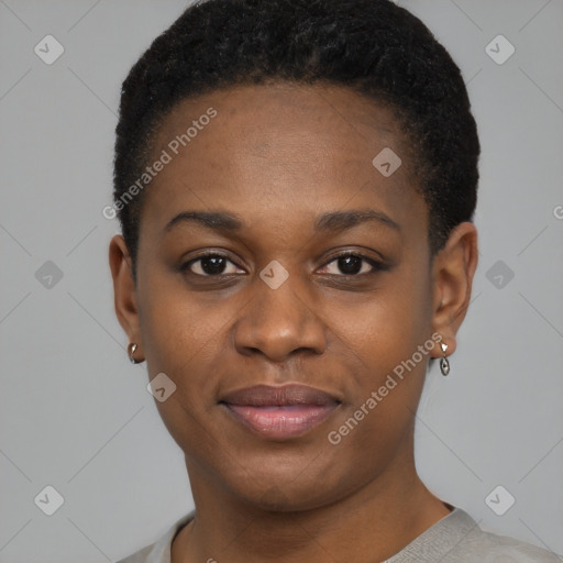 Joyful black young-adult female with short  black hair and brown eyes