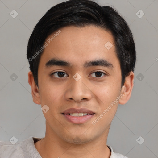 Joyful asian young-adult male with short  black hair and brown eyes