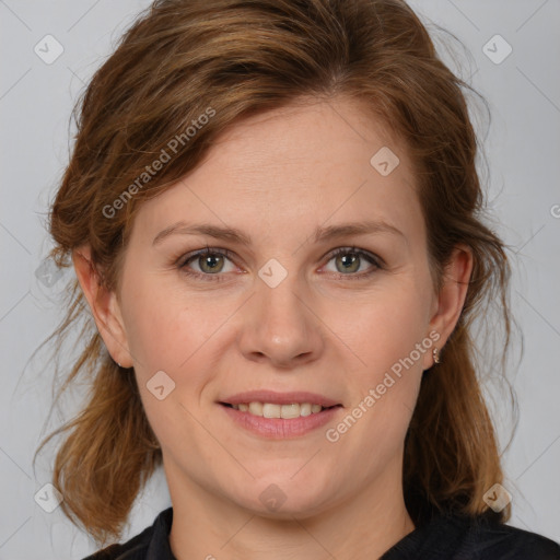 Joyful white young-adult female with medium  brown hair and blue eyes