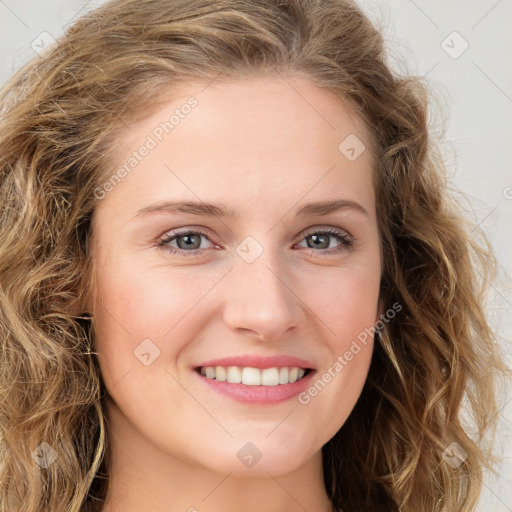 Joyful white young-adult female with long  brown hair and green eyes