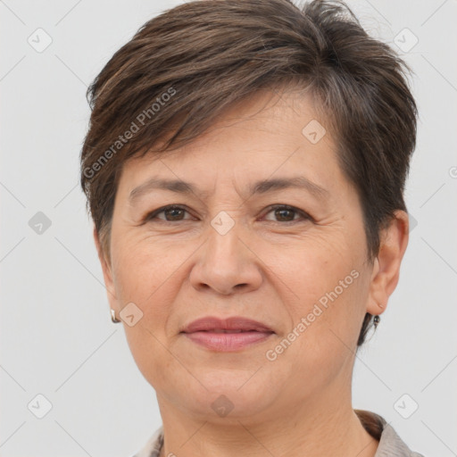 Joyful white adult female with short  brown hair and brown eyes