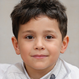 Joyful white child male with short  brown hair and brown eyes