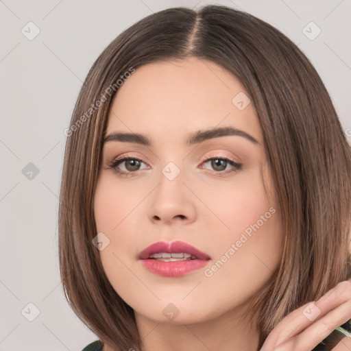 Neutral white young-adult female with medium  brown hair and brown eyes