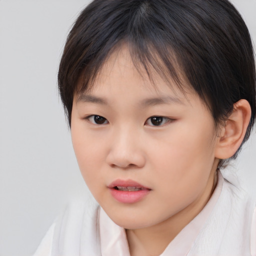 Neutral asian child female with medium  brown hair and brown eyes