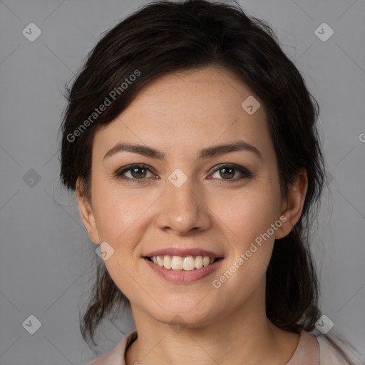 Joyful white young-adult female with medium  brown hair and brown eyes