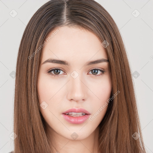 Neutral white young-adult female with long  brown hair and brown eyes