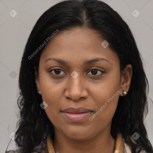 Joyful black young-adult female with long  brown hair and brown eyes