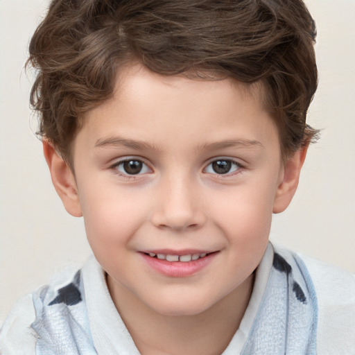 Joyful white child male with short  brown hair and brown eyes