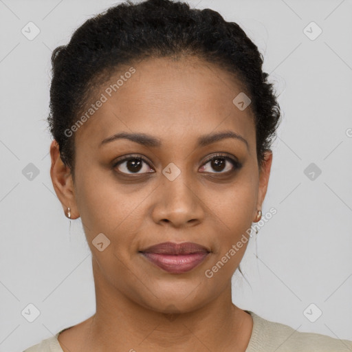 Joyful black young-adult female with short  brown hair and brown eyes