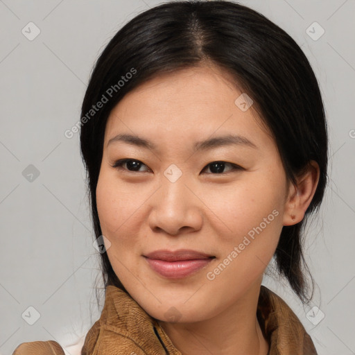 Joyful asian young-adult female with medium  brown hair and brown eyes