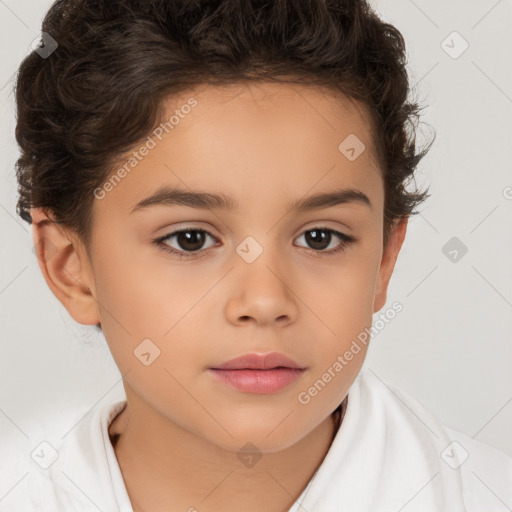 Joyful white child female with short  brown hair and brown eyes