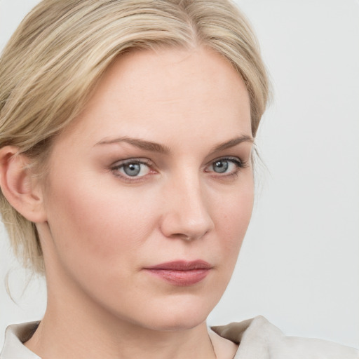 Neutral white young-adult female with medium  brown hair and blue eyes