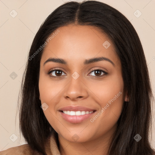 Joyful latino young-adult female with long  brown hair and brown eyes