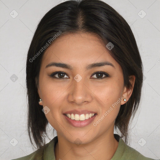 Joyful asian young-adult female with medium  brown hair and brown eyes