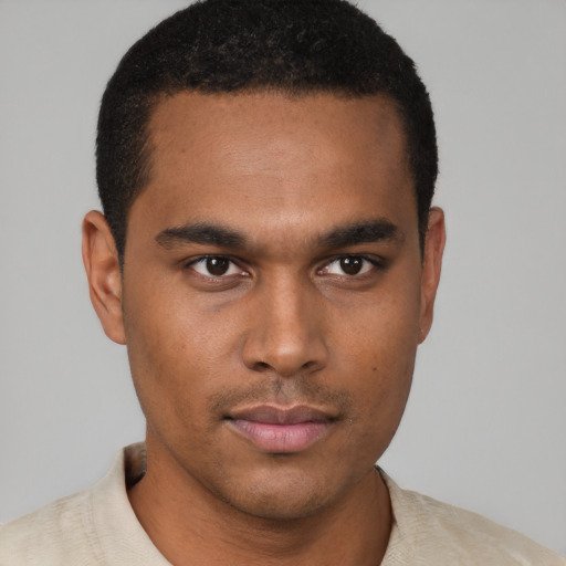Neutral black young-adult male with short  brown hair and brown eyes